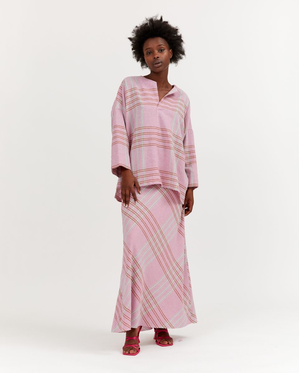 https://www.seamehappy.be/wp-content/uploads/2023/07/Sea-Me-Happy-June-Skirt-Soft-Wool-Checked-pink-front1-960x1200.jpg