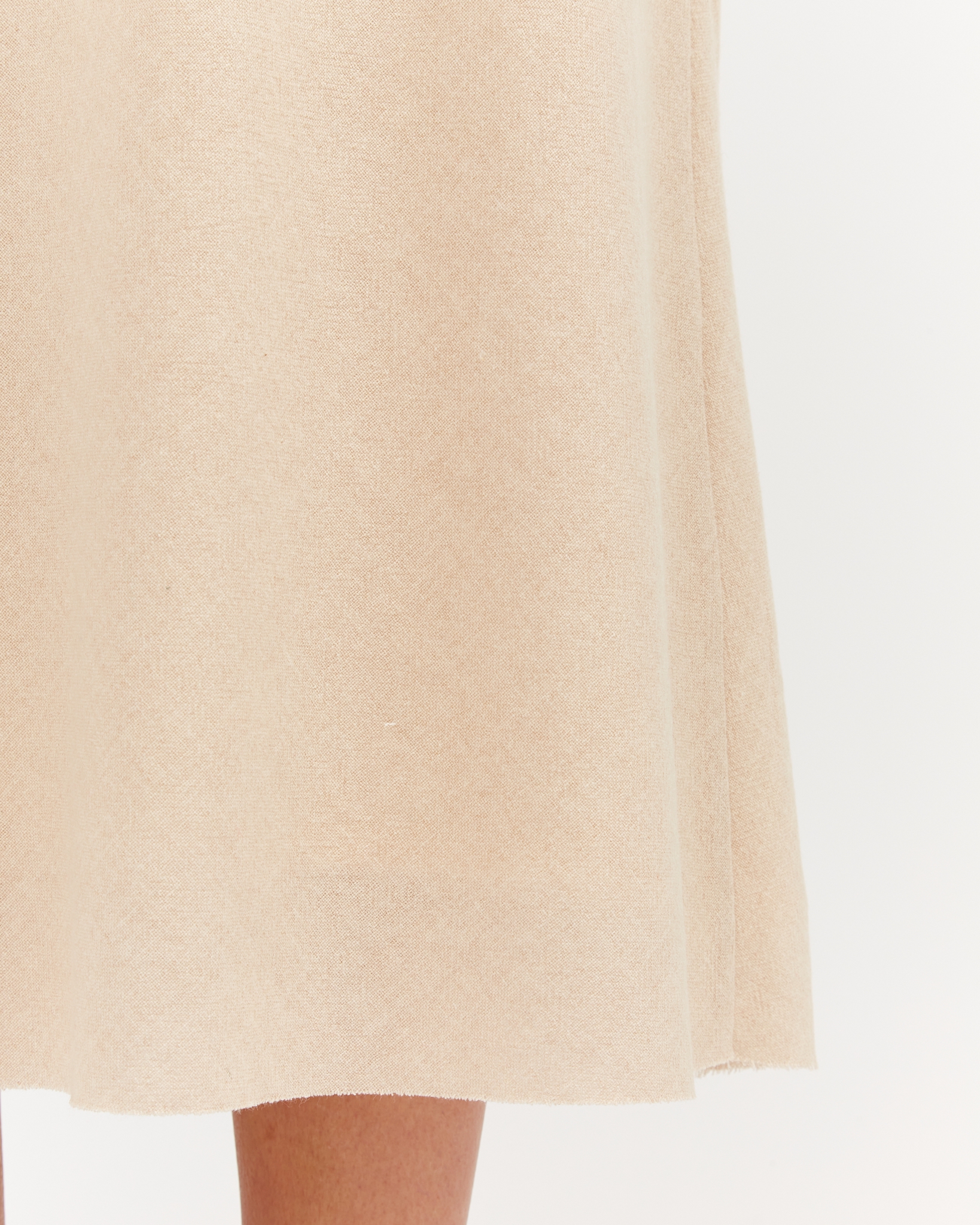 https://www.seamehappy.be/wp-content/uploads/2023/07/Sea-Me-Happy-June-Skirt-Soft-Wool-Uni-beige-closeup.jpg