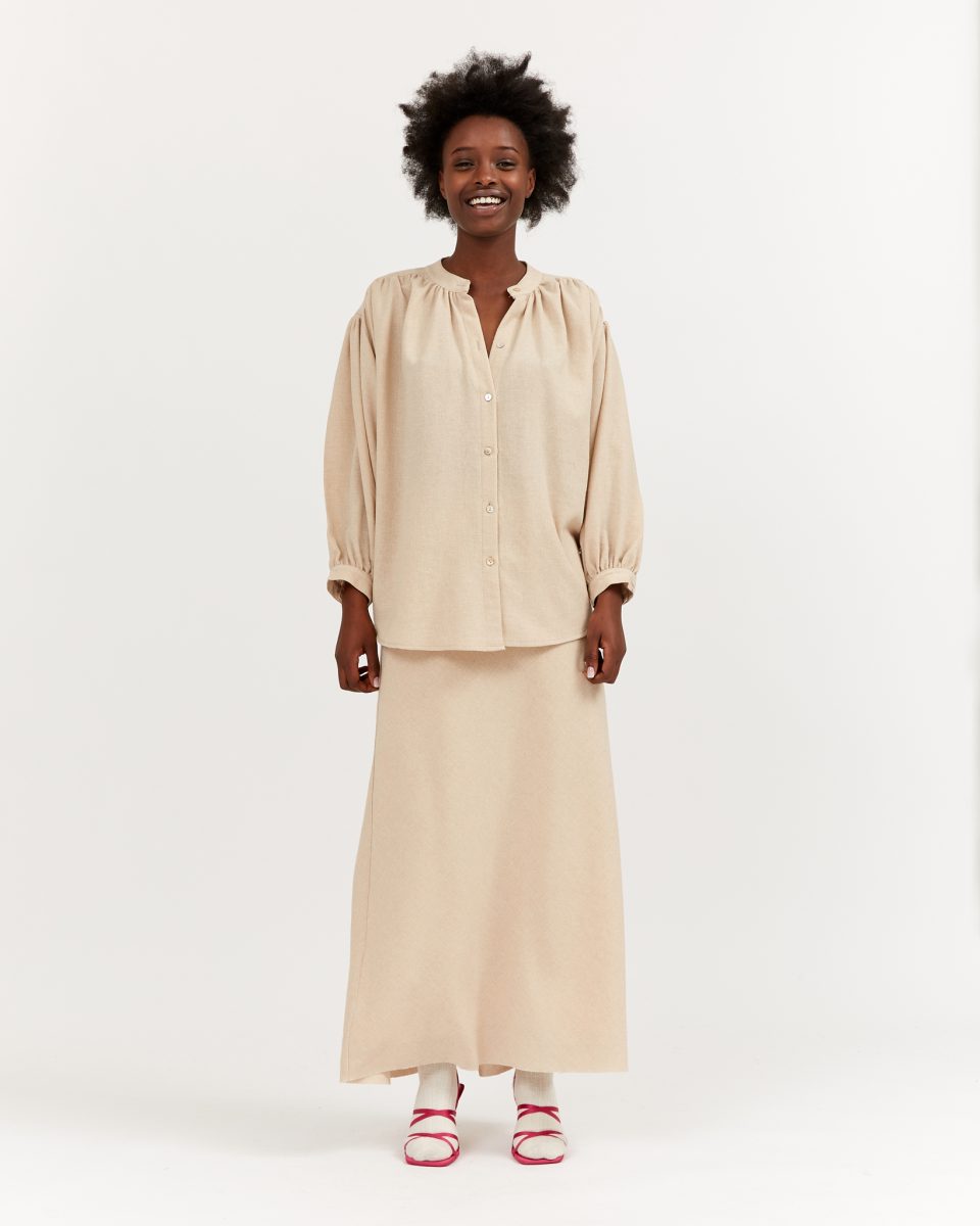 https://www.seamehappy.be/wp-content/uploads/2023/07/Sea-Me-Happy-June-Skirt-Soft-Wool-Uni-beige-front1-960x1200.jpg