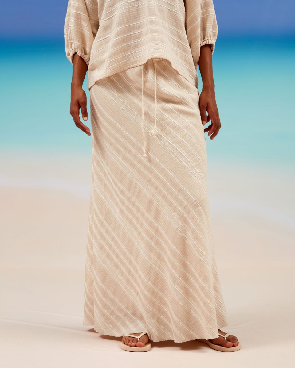 https://www.seamehappy.be/wp-content/uploads/2024/02/Sea-Me-Happy-Praia-Skirt-Six-Senses-beige-stripes-front-960x1200.jpg