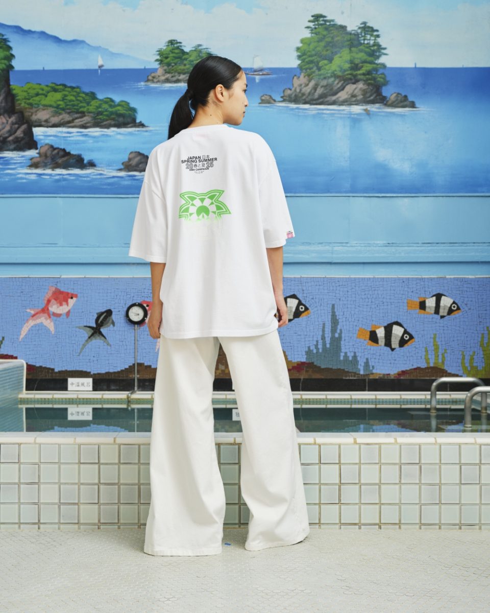 https://www.seamehappy.be/wp-content/uploads/2026/06/Sea-me-Happy-Campaign-T-Shirt-SMH-green-back-8191-960x1200.jpg